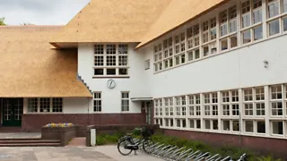 Maak een fietstour langs Dudoks veelzijdige schoolgebouwen